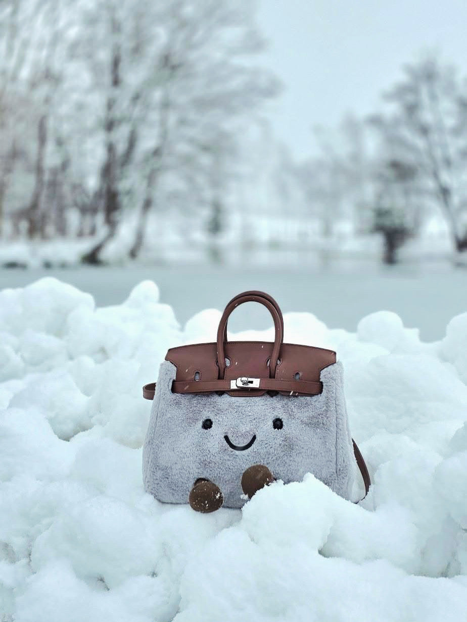 Little Miss Fluffy →